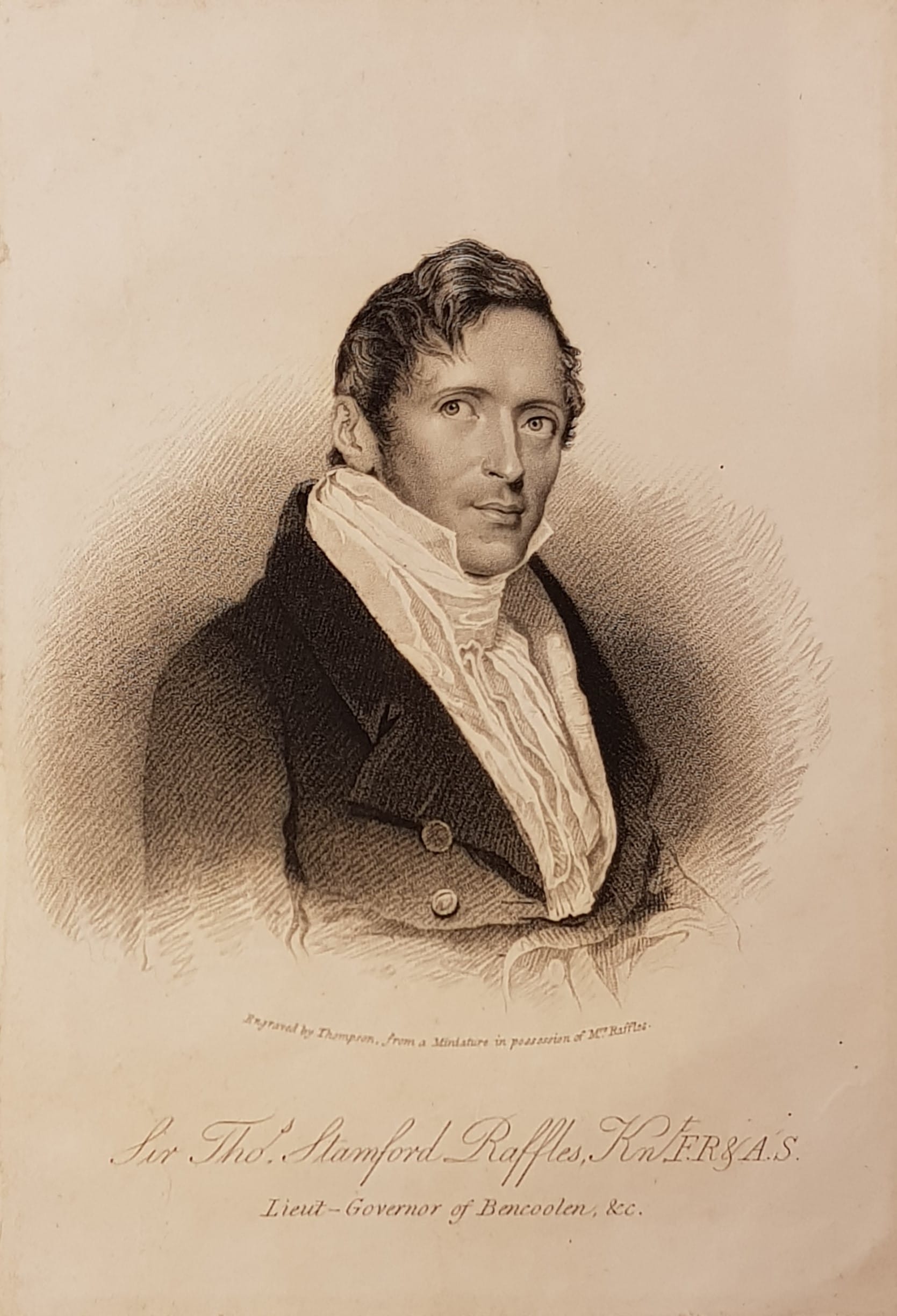 The image depicts Sir Thomas Stamford Raffles in formal attire with an inscription of his name and title below.